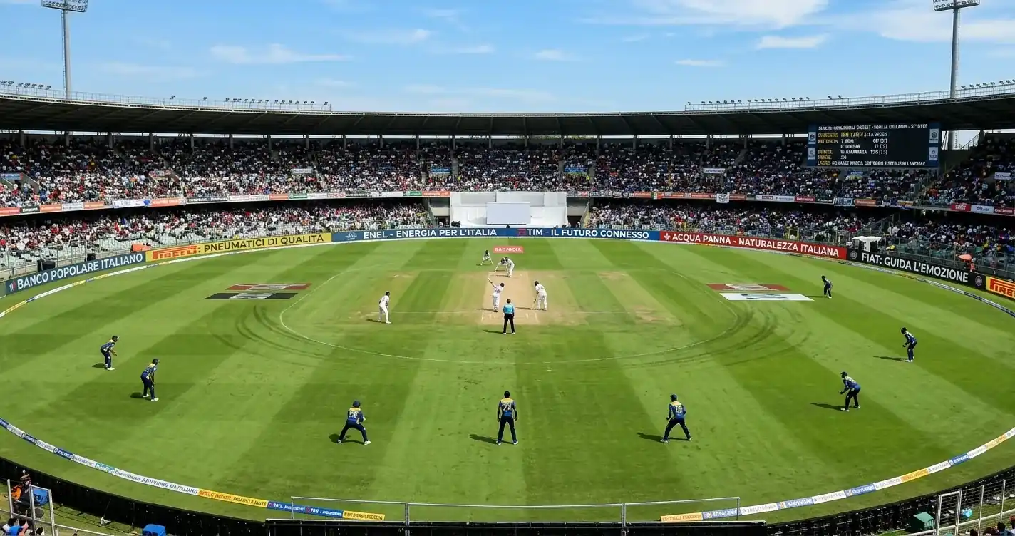 Panoramica del campo da cricket con fielder posizionati in profondità